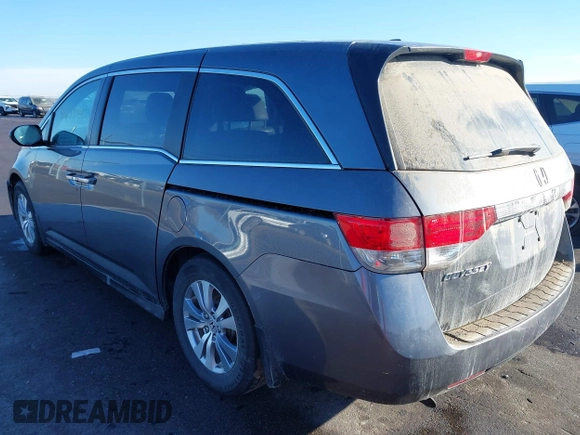 2014 Honda Odyssey EX-L with VIN 5FNRL5H61EB079739, listed as a IAAI auction lot 41659048 with 137,012 mi miles and . Bid and sale history available at carsss.com. Image 3.