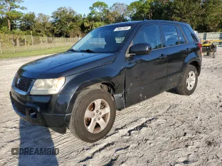 2007 Suzuki Grand Vitara z VIN JS3TE941674200553, wystawiony jako Copart lot #75667344 z przebiegiem 177 312 mil mil oraz Szkoda całkowita • Salvage title. Historia ofert i sprzedaży dostępna na DreamBid. Obrazek 1.