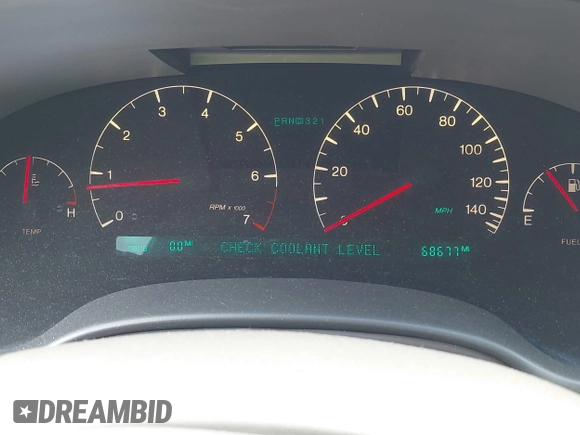 2004 Cadillac DeVille DHS z VIN 1G6KE54Y64U110060, wystawiony jako IAAI lot #42133610 z przebiegiem 68 677 mil mil oraz . Historia ofert i sprzedaży dostępna na DreamBid. Obrazek 7.