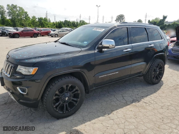 2014 Jeep Grand Cherokee Overland with VIN 1C4RJFCG6EC547604, listed as a Copart auction lot 55824944 with 128,330 mi miles and Clean Title. Bid and sale history available at carsss.com. Image 1.