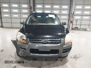 2007 Kia Sportage LX z VIN KNDJE723177439778, wystawiony jako IAAI lot #42279004 z przebiegiem 198 994 mil mil oraz . Historia ofert i sprzedaży dostępna na DreamBid. Obrazek 12.