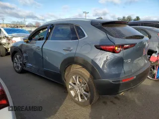 2021 Mazda CX-30 Premium with VIN 3MVDMBDM2MM220739, listed as a Copart auction lot 86848764 with 48,522 mi miles and Salvage title. Bid and sale history available at DreamBid. Image 2.