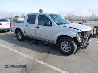 2014 Nissan Frontier SV with VIN 1N6AD0ER0EN727159, listed as a IAAI auction lot 41916363 with 89,197 mi miles and . Bid and sale history available at DreamBid. Image 1.