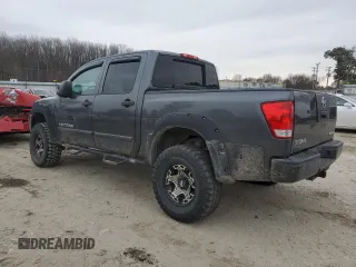 2010 Nissan Titan LE with VIN 1N6BA0ECXAN310425, listed as a Copart auction lot 88897755 with 132,467 mi miles and Salvage Title. Bid and sale history available at carsss.com. Image 2.