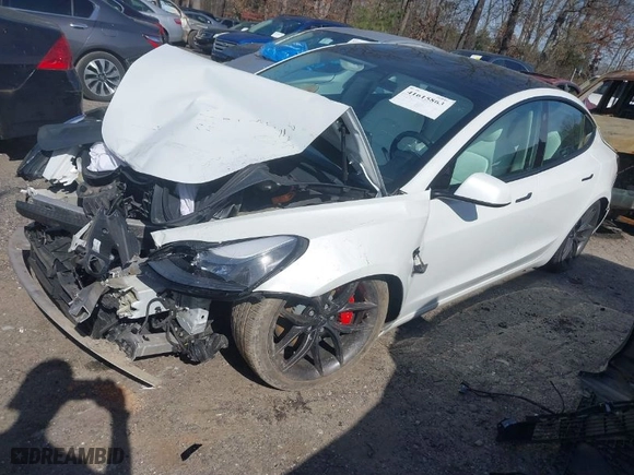 2021 Tesla Model 3 Performance with VIN 5YJ3E1EC6MF020249, listed as a IAAI auction lot 41615863 with 1 mi miles. Bid and sale history available at carsss.com. Image 2.