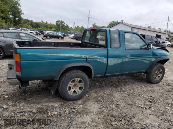 1997 Nissan Frontier XE with VIN 1N6SD16Y0VC329686, listed as a Copart auction lot 73103584 with 105,657 mi miles and Salvage title. Bid and sale history available at DreamBid. Image 3.