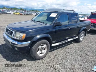 2000 Nissan Frontier XE with VIN 1N6ED27T3YC422325, listed as a IAAI auction lot 42268431 with 169,994 mi miles and . Bid and sale history available at DreamBid. Image 2.
