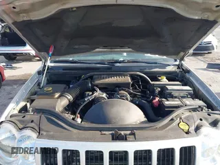 2005 Jeep Grand Cherokee Laredo with VIN 1J8GS48K35C591154, listed as a IAAI auction lot 42107302 with 196,237 mi miles and . Bid and sale history available at DreamBid. Image 10.