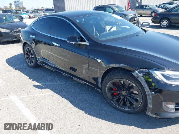 2017 Tesla Model S 100D with VIN 5YJSA1E21HF202591, listed as a IAAI auction lot 41983073 with 140,282 mi miles and . Bid and sale history available at DreamBid. Image 6.
