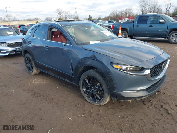 2022 Mazda CX-30 2.5 S Preferred Package with VIN 3MVDMBCL3NM422497, listed as a IAAI auction lot 41236220 with 57,752 mi miles. Bid and sale history available at carsss.com. Image 1.