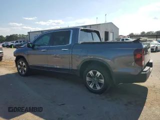 2017 Honda Ridgeline RTL-E with VIN 5FPYK3F70HB004377, listed as a Copart auction lot 52201415 with 170,729 mi miles and Salvage title. Bid and sale history available at DreamBid. Image 2.