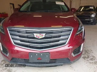 2018 Cadillac XT5 Premium Luxury AWD z VIN 1GYKNFRS6JZ114464, wystawiony jako IAAI lot #42320302 z przebiegiem 61 231 mil mil oraz . Historia ofert i sprzedaży dostępna na DreamBid. Obrazek 12.