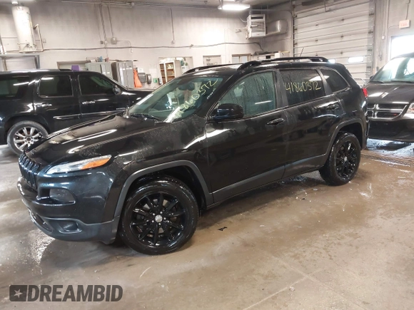 2014 Jeep Cherokee Latitude with VIN 1C4PJMCS0EW291135, listed as a IAAI auction lot 41860372 with 171,524 mi miles and . Bid and sale history available at DreamBid. Image 2.