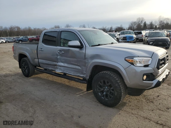 2021 Toyota Tacoma 4WD SR5 with VIN 3TMDZ5BN3MM103509, listed as a Copart auction lot 51150615 with 54,566 mi miles and Salvage Title. Bid and sale history available at carsss.com. Image 4.