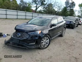 2019 Ford Edge Titanium z VIN 2FMPK3K91KBB54381, wystawiony jako Copart lot #52979555 z przebiegiem 99 127 mil mil oraz Szkoda całkowita • Salvage title. Historia ofert i sprzedaży dostępna na DreamBid. Obrazek 11.