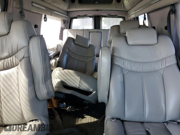 2006 GMC Savana z VIN 1GDGG29U661252944, wystawiony jako Copart lot #76284894 z przebiegiem 192 410 mil mil oraz Szkoda całkowita • Salvage title. Historia ofert i sprzedaży dostępna na DreamBid. Obrazek 10.