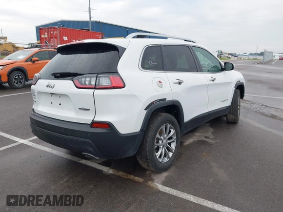 2021 Jeep Cherokee Latitude Lux z VIN 1C4PJMMX4MD221786, wystawiony jako IAAI lot #42432825 z przebiegiem 54 297 mil mil oraz . Historia ofert i sprzedaży dostępna na DreamBid. Obrazek 4.