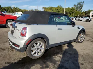 2013 MINI Convertible S with VIN WMWZP3C50DT550800, listed as a Copart auction lot 42409015 with 101,421 mi miles and Salvage title. Bid and sale history available at DreamBid. Image 3.