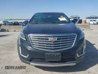 2017 Cadillac XT5 Platinum AWD z VIN 1GYKNFRS7HZ103127, wystawiony jako IAAI lot #41830037 z przebiegiem 82 480 mil mil oraz . Historia ofert i sprzedaży dostępna na DreamBid. Obrazek 13.