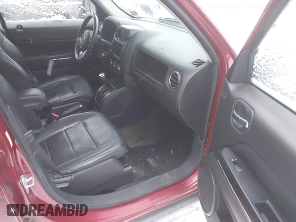 2014 Jeep Patriot Limited with VIN 1C4NJRCB1ED728821, listed as a IAAI auction lot 41241749 with 122,967 mi miles and . Bid and sale history available at DreamBid. Image 5.