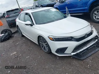 2024 Honda Civic Touring z VIN 2HGFE1F93RH341247, wystawiony jako IAAI lot #42102894 z przebiegiem Nie podano mil oraz . Historia ofert i sprzedaży dostępna na DreamBid. Obrazek 1.