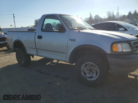2003 Ford F-150 XL with VIN 1FTRF182X3NB38752, listed as a Copart auction lot 42796835 with Not provided miles and Clean title. Bid and sale history available at DreamBid. Image 4.