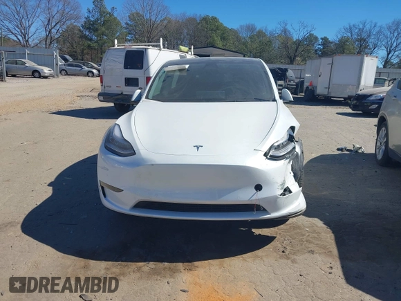 2021 Tesla Model Y Long Range with VIN 5YJYGDEE8MF125104, listed as a IAAI auction lot 41698065 with 25,177 mi miles and . Bid and sale history available at DreamBid. Image 11.