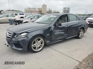 2014 Mercedes-Benz E 350 Sport with VIN WDDHF5KB2EA855397, listed as a Copart auction lot 54018965 with 133,262 mi miles and Salvage title. Bid and sale history available at DreamBid. Image 1.