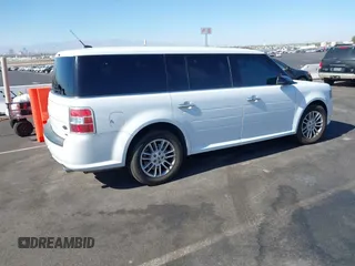 2016 Ford Flex SEL with VIN 2FMHK6C85GBA12635, listed as a IAAI auction lot 40715147 with 104,573 mi miles. Bid and sale history available at carsss.com. Image 4.