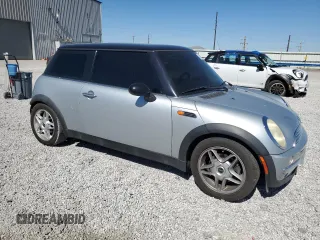 2002 MINI Hardtop with VIN WMWRC33472TC34281, listed as a Copart auction lot 71631644 with 196,947 mi miles and Salvage Title. Bid and sale history available at DreamBid. Image 4.
