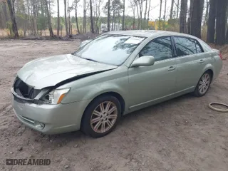 2005 Toyota Avalon XL with VIN 4T1BK36B55U033424, listed as a IAAI auction lot 41954652 with 231,640 mi miles. Bid and sale history available at carsss.com. Image 2.