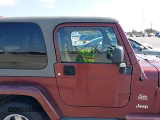 2004 Jeep Wrangler Sahara with VIN 1J4FA59S24P739581, listed as a IAAI auction lot 41696146 with 232,139 mi miles and . Bid and sale history available at DreamBid. Image 13.