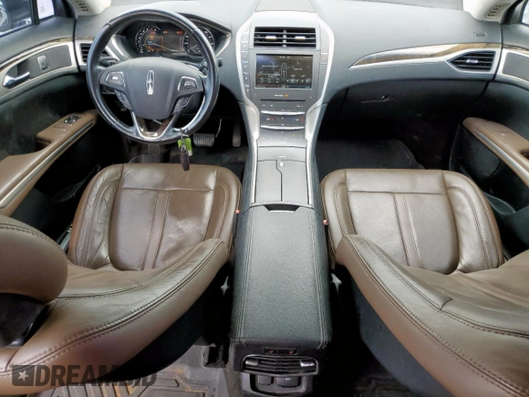 2015 Lincoln MKZ с VIN 3LN6L2J99FR608534, выставлен на аукционе Copart как лот 63588325 с пробегом 96 684 миль миль и Списание • Salvage title. История ставок и продаж доступна на DreamBid. Изображение 8.