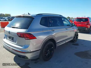 2023 Volkswagen Tiguan SE R-Line Black with VIN 3VVCB7AX7PM137019, listed as a IAAI auction lot 40731252 with 20,098 mi miles. Bid and sale history available at carsss.com. Image 4.