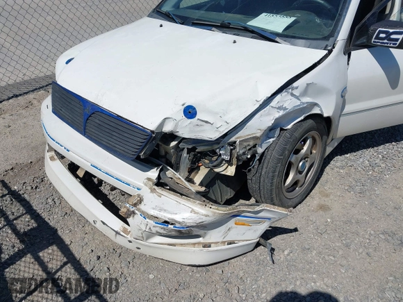 2002 Mitsubishi Lancer OZ-Rally with VIN JA3AJ86E42U039140, listed as a IAAI auction lot 41853888 with 328,181 mi miles and . Bid and sale history available at DreamBid. Image 6.