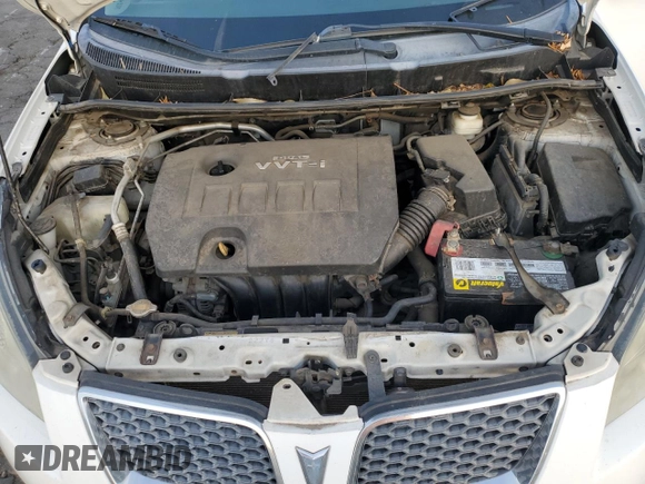 2009 Pontiac Vibe w/1SA with VIN 5Y2SL67809Z439030, listed as a Copart auction lot 87419194 with 104,518 mi miles and Salvage Title. Bid and sale history available at carsss.com. Image 12.