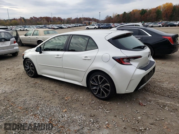 2019 Toyota Corolla Hatchback SE with VIN JTNK4RBEXK3051691, listed as a Copart auction lot 77159164 with 21,051 mi miles and Salvage Title. Bid and sale history available at carsss.com. Image 2.