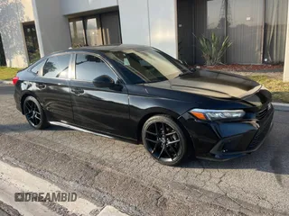 2022 Honda Civic Sport z VIN 2HGFE2F58NH539528, wystawiony jako Copart lot #60940165 z przebiegiem 28 864 mil mil oraz Czysty tytuł • Clean title. Historia ofert i sprzedaży dostępna na DreamBid. Obrazek 1.