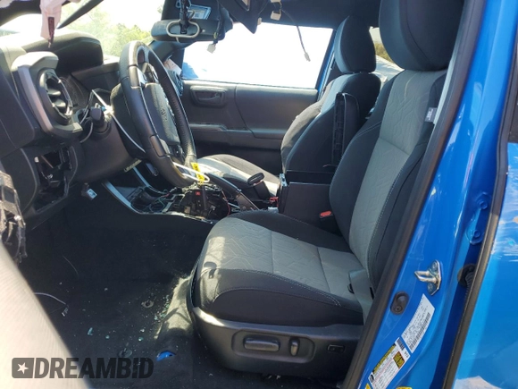 2020 Toyota Tacoma SR5 z VIN 3TMCZ5AN6LM310164, wystawiony jako Copart lot #47098995 z przebiegiem 18 285 mil mil oraz Szkoda całkowita • Salvage title. Historia ofert i sprzedaży dostępna na DreamBid. Obrazek 7.
