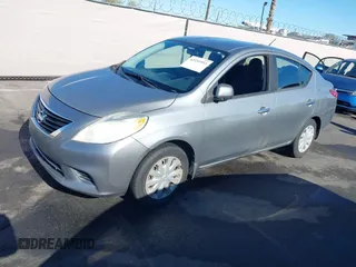 2012 Nissan Versa SV with VIN 3N1CN7AP0CL921230, listed as a IAAI auction lot 42151993 with 184,676 mi miles. Bid and sale history available at carsss.com. Image 2.