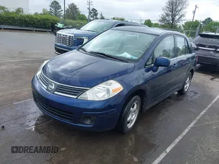 2007 Nissan Versa 1.8 SL with VIN 3N1BC11E67L420474, listed as a IAAI auction lot 41887735 with 199,094 mi miles. Bid and sale history available at carsss.com. Image 2.