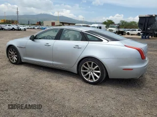2011 Jaguar XJ with VIN SAJWA1CB9BLV05595, listed as a Copart auction lot 54947855 with 39,516 mi miles and Salvage title. Bid and sale history available at DreamBid. Image 2.