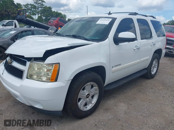 2007 Chevrolet Tahoe LTZ with VIN 1GNFC13J47J336516, listed as a IAAI auction lot 42545424 with 211,669 mi miles and . Bid and sale history available at DreamBid. Image 2.