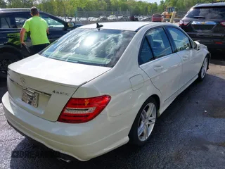2012 Mercedes-Benz C with VIN WDDGF8BB9CR230328, listed as a IAAI auction lot 42024792 with 129,739 mi miles. Bid and sale history available at carsss.com. Image 4.