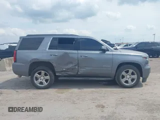 2019 Chevrolet Tahoe LT z VIN 1GNSCBKC8KR406519, wystawiony jako IAAI lot #42145021 z przebiegiem 74 694 mil mil oraz . Historia ofert i sprzedaży dostępna na DreamBid. Obrazek 13.