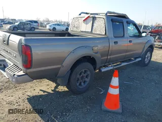 2003 Nissan Frontier XE with VIN 1N6ED29X53C406104, listed as a IAAI auction lot 41001244 with 227,871 mi miles and . Bid and sale history available at DreamBid. Image 4.