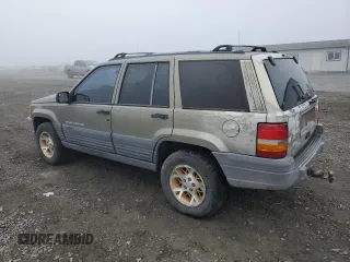 1997 Jeep Grand Cherokee Laredo with VIN 1J4GZ58Y5VC637350, listed as a Copart auction lot 77405444 with 182,482 mi miles and Clean Title. Bid and sale history available at carsss.com. Image 2.