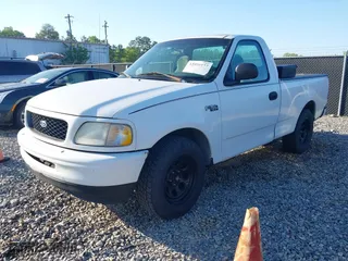 1998 Ford F-150 Standard with VIN 1FTZF1728WNC10750, listed as a IAAI auction lot 42036177 with 237,434 mi miles. Bid and sale history available at carsss.com. Image 2.