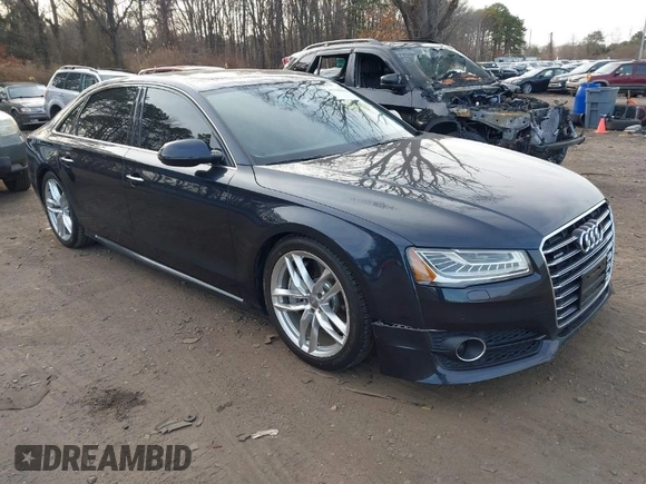 2017 Audi A8 L with VIN WAU44AFDXHN006857, listed as a IAAI auction lot 41758062 with 88,385 mi miles. Bid and sale history available at carsss.com. Image 1.