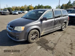 2014 Dodge Grand Caravan SXT z VIN 2C4RDGCG7ER427864, wystawiony jako Copart lot #54353185 z przebiegiem 209 382 mil mil oraz Nie do naprawy. Historia ofert i sprzedaży dostępna na DreamBid. Obrazek 1.